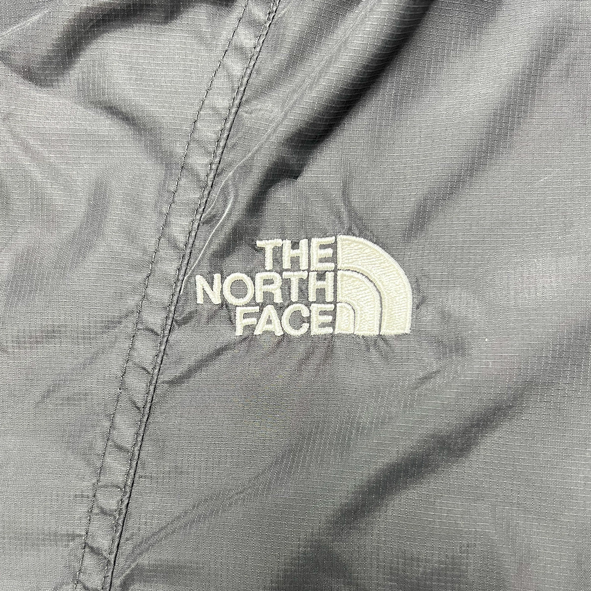 10081【THE NORTH FACE】ザノースフェイス メンズ ウィンドブレーカー ジャケット ブラック 85/XS