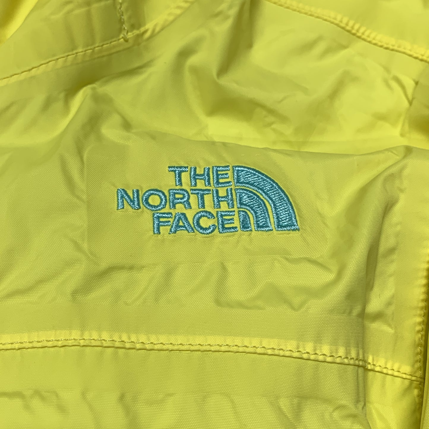 30005【THE NORTH FACE】ザノースフェイス キッズ HYVENT ハイベント ナイロンパーカー イエロー L